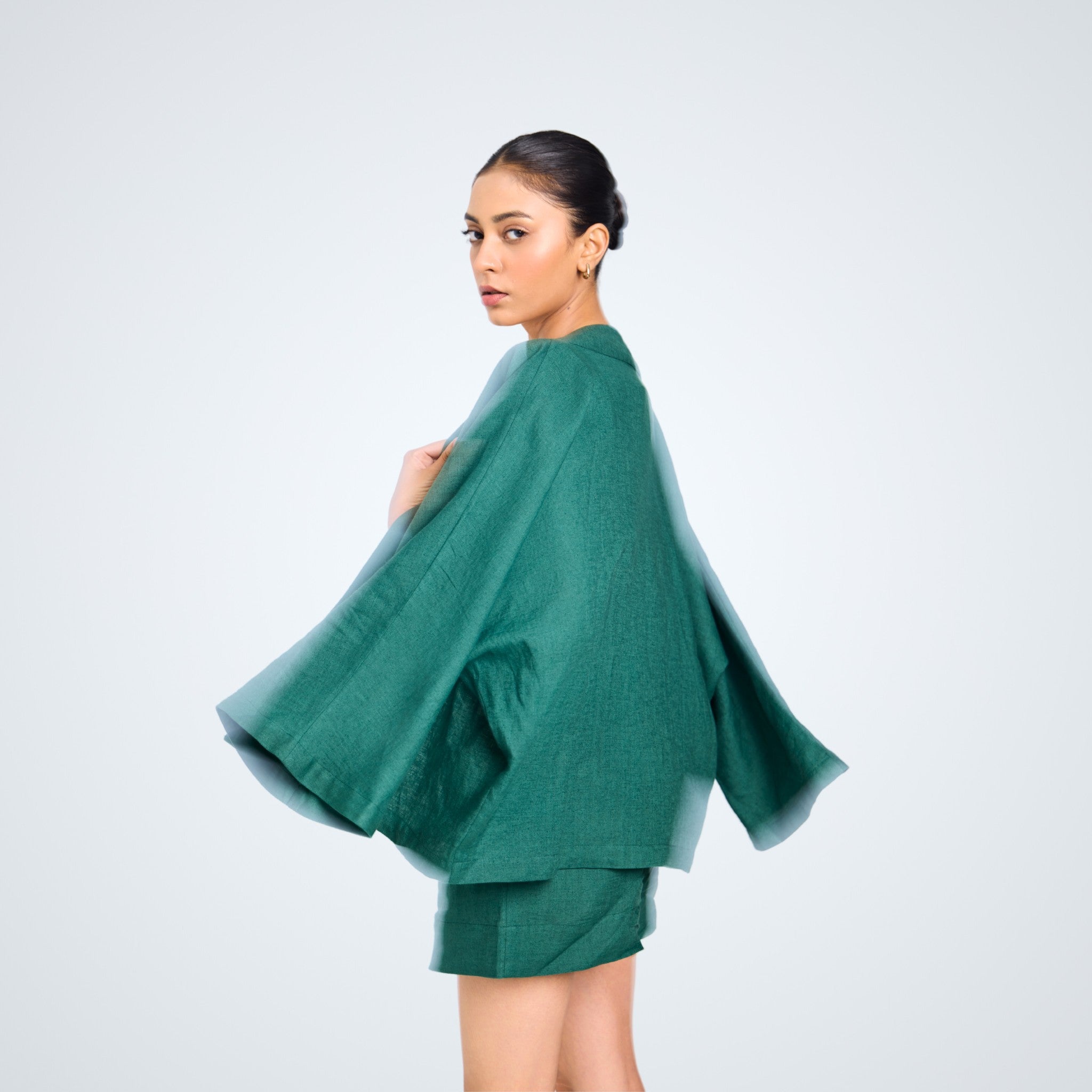 Short emerald linen shrug with roomy sleeves. Breathable, versatile, and weightless – perfect over tanks, dresses, or playsuits | Selfish Clarity
