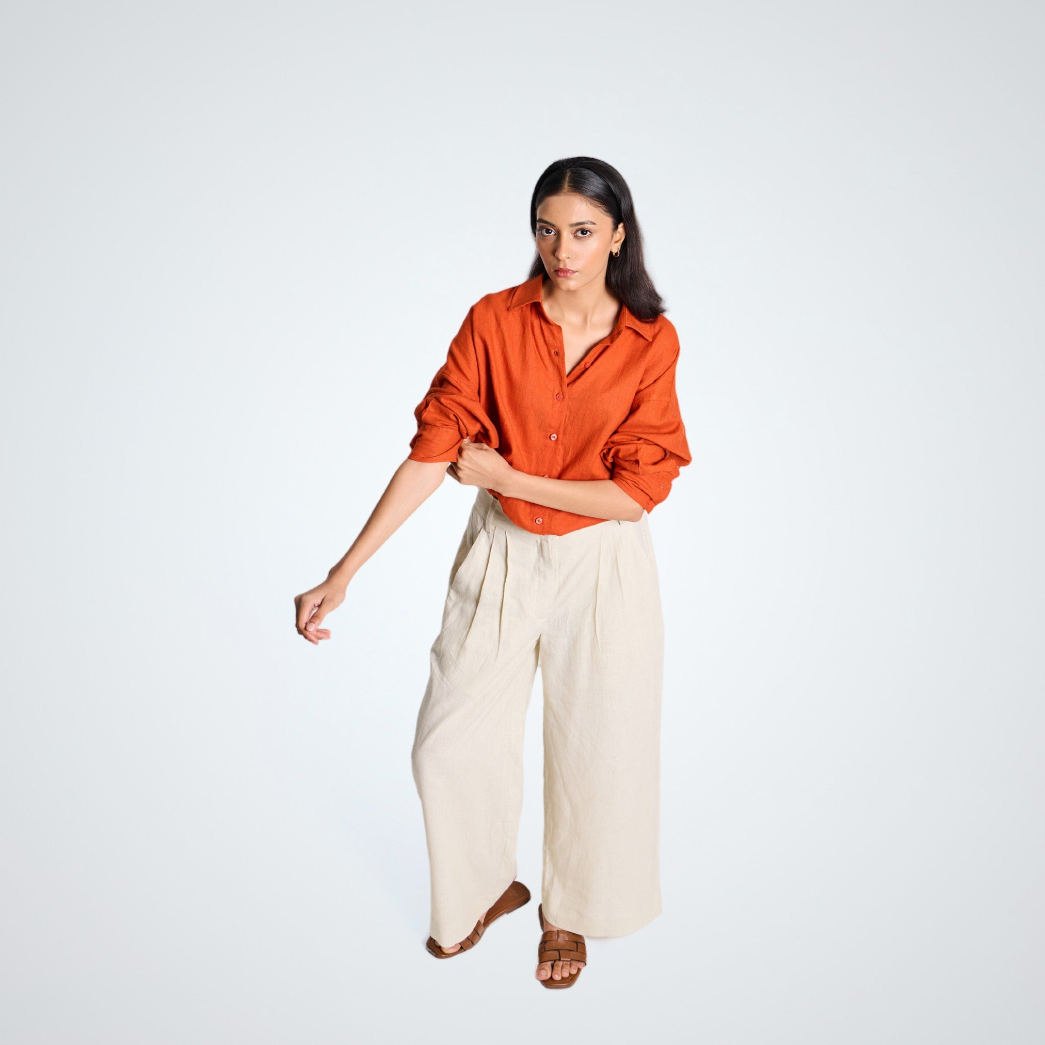 A breathable, relaxed-fit orange rust linen shirt that adapts to your flow. Lightweight, versatile, and built for effortless everyday style | Selfish Clarity