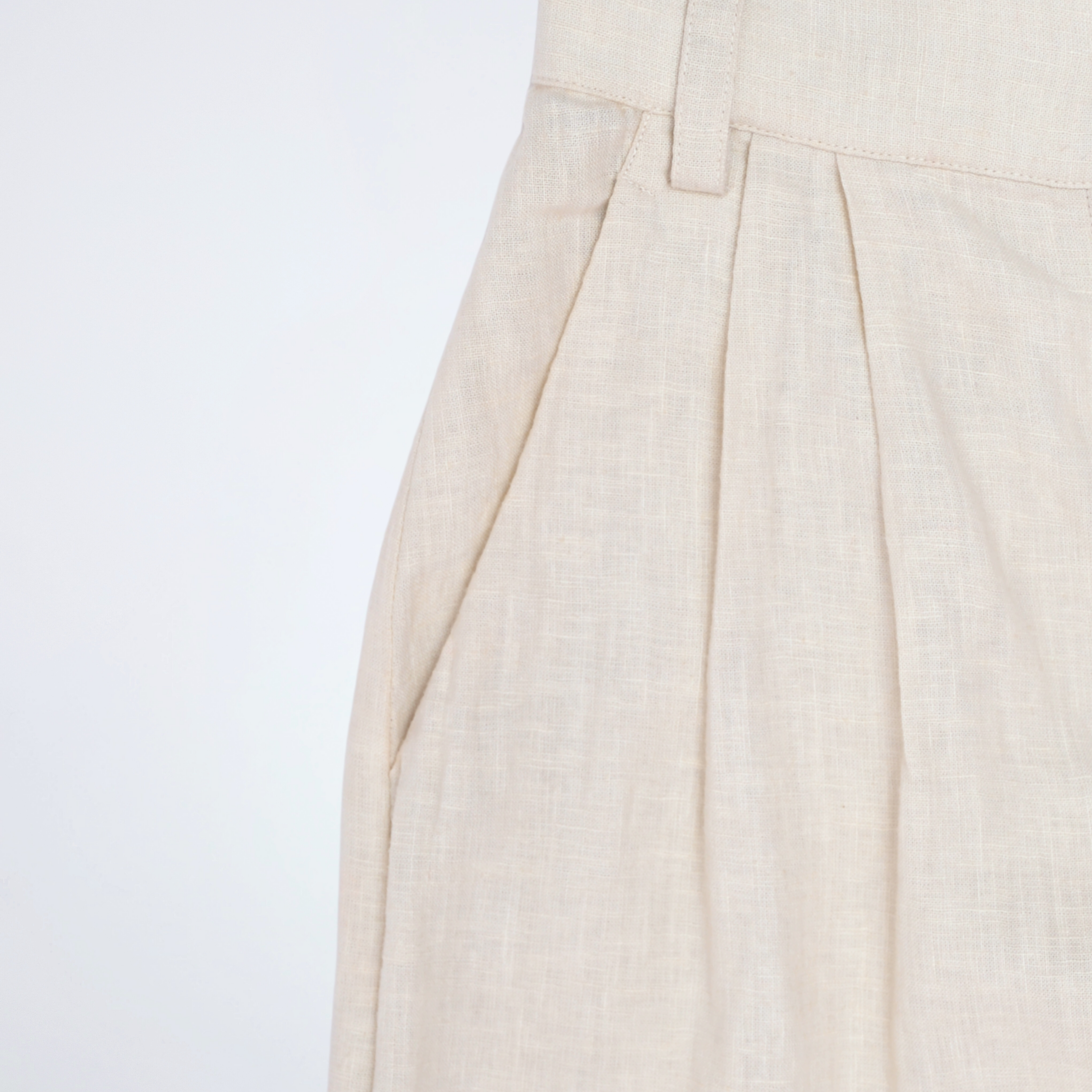 Pearl linen pants with soft pleats and a stretch waist. Lightweight, breathable, and roomy for all-day comfort and movement | Selfish Clarity