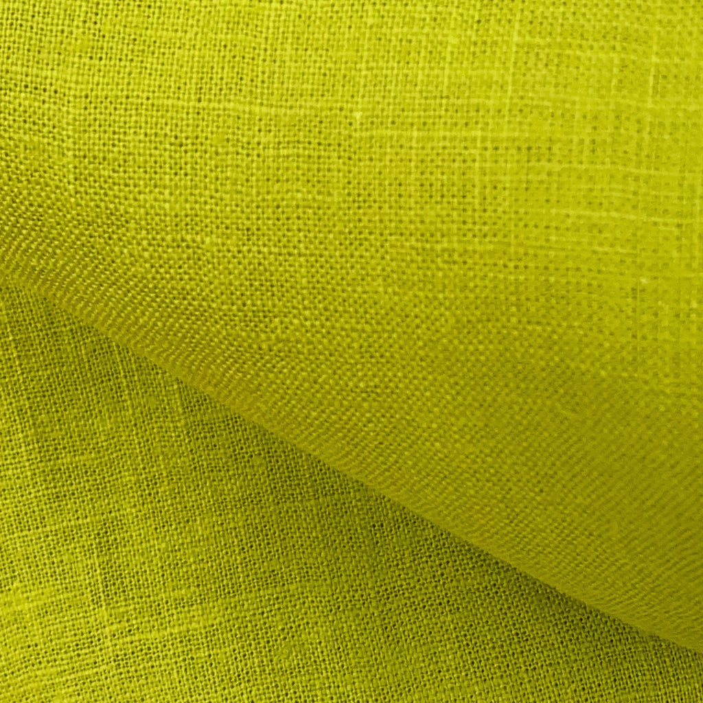 Close-up of accent green linen fabric with a textured surface