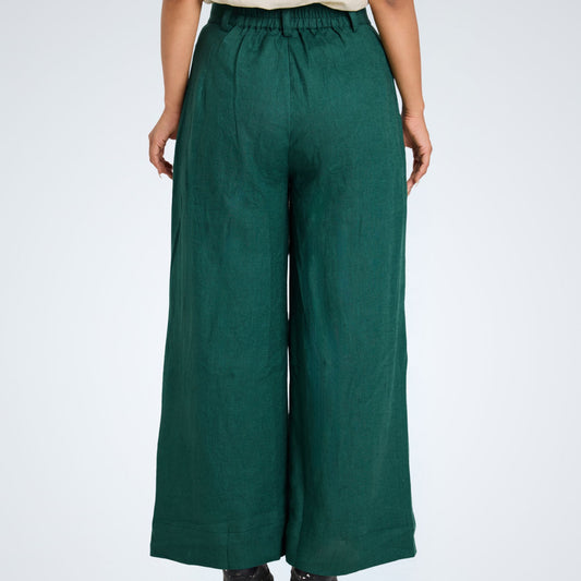 Emerald green linen pants with stretch waist. Breathable fabric, relaxed fit, and easy movement for casual or dressed-up days