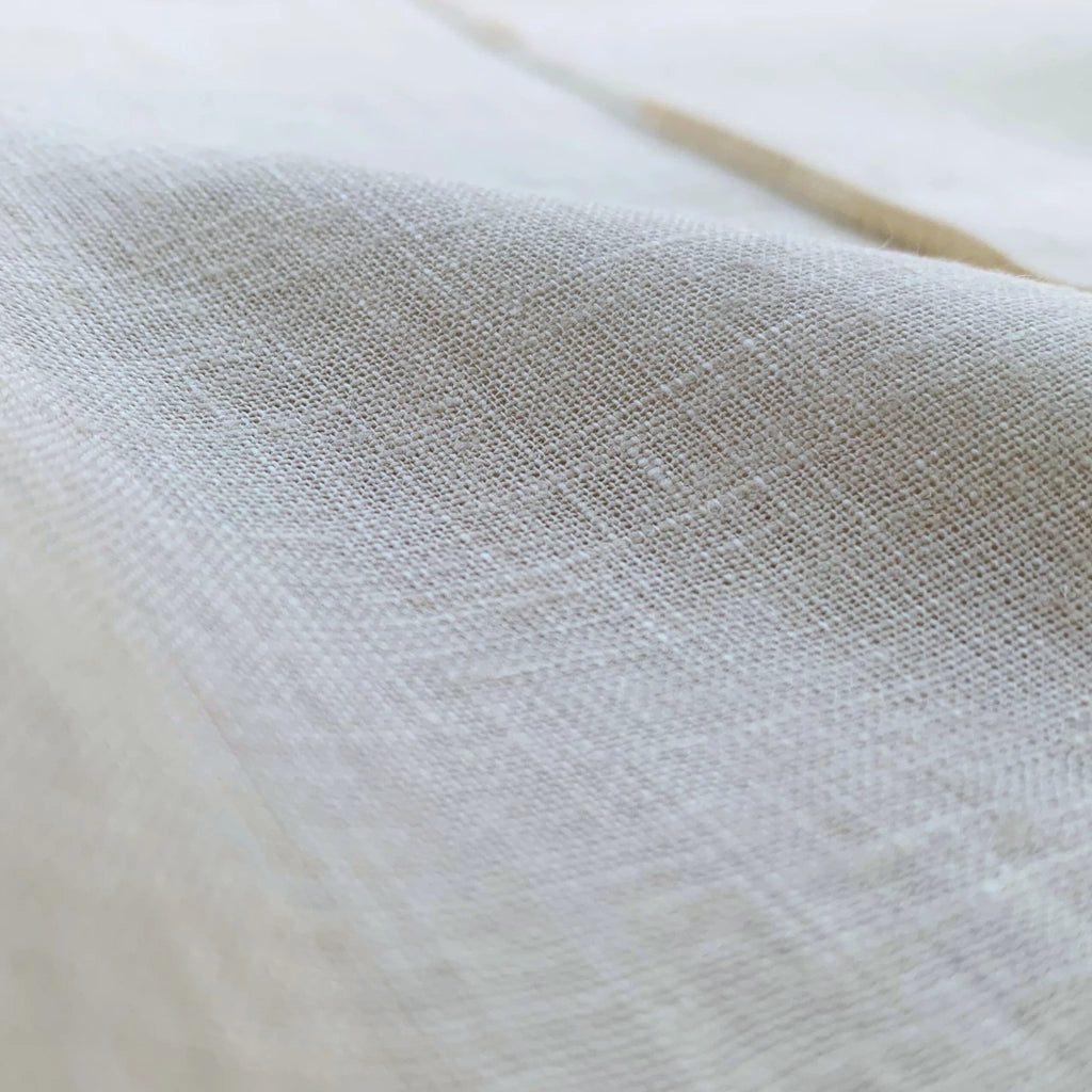 Pearl linen pants with soft pleats and a stretch waist. Lightweight, breathable, and roomy for all-day comfort and movement | Selfish Clarity