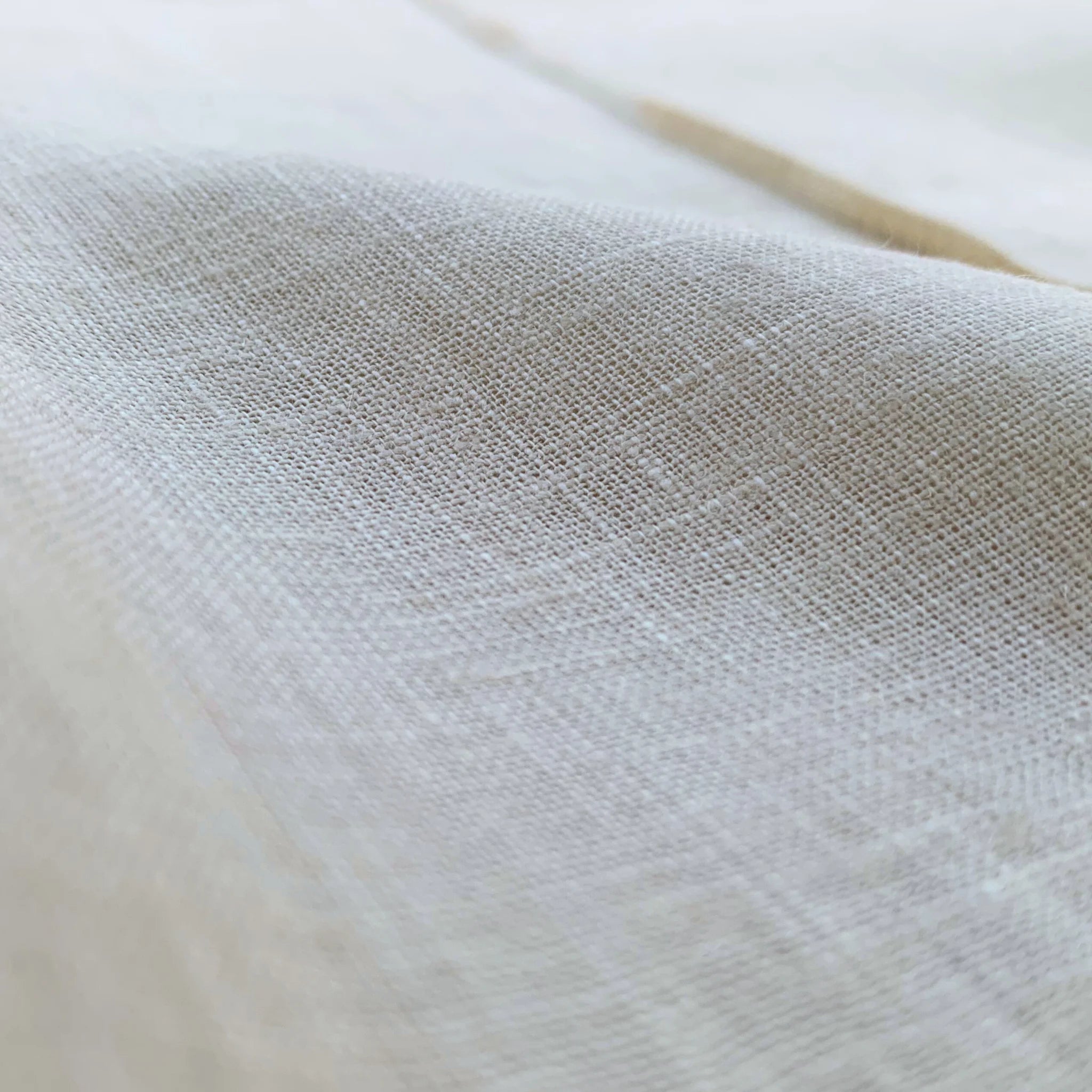 Pearl linen pants with soft pleats and a stretch waist. Lightweight, breathable, and roomy for all-day comfort and movement | Selfish Clarity