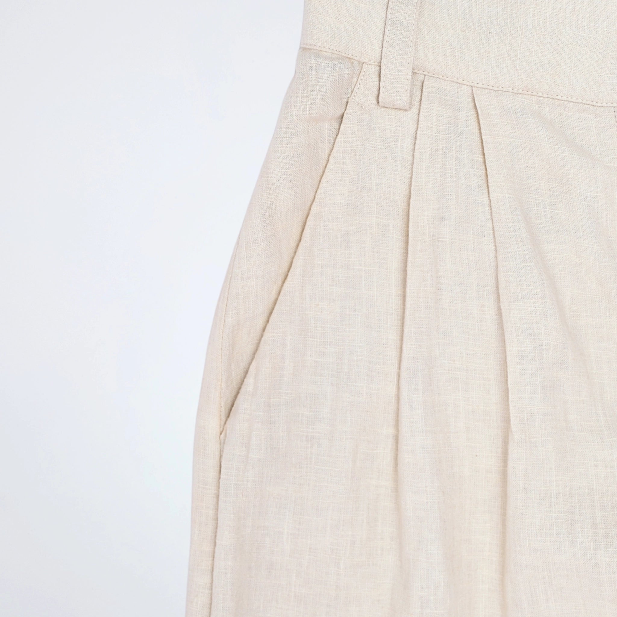 Pearl linen pants with soft pleats and a stretch waist. Lightweight, breathable, and roomy for all-day comfort and movement | Selfish Clarity