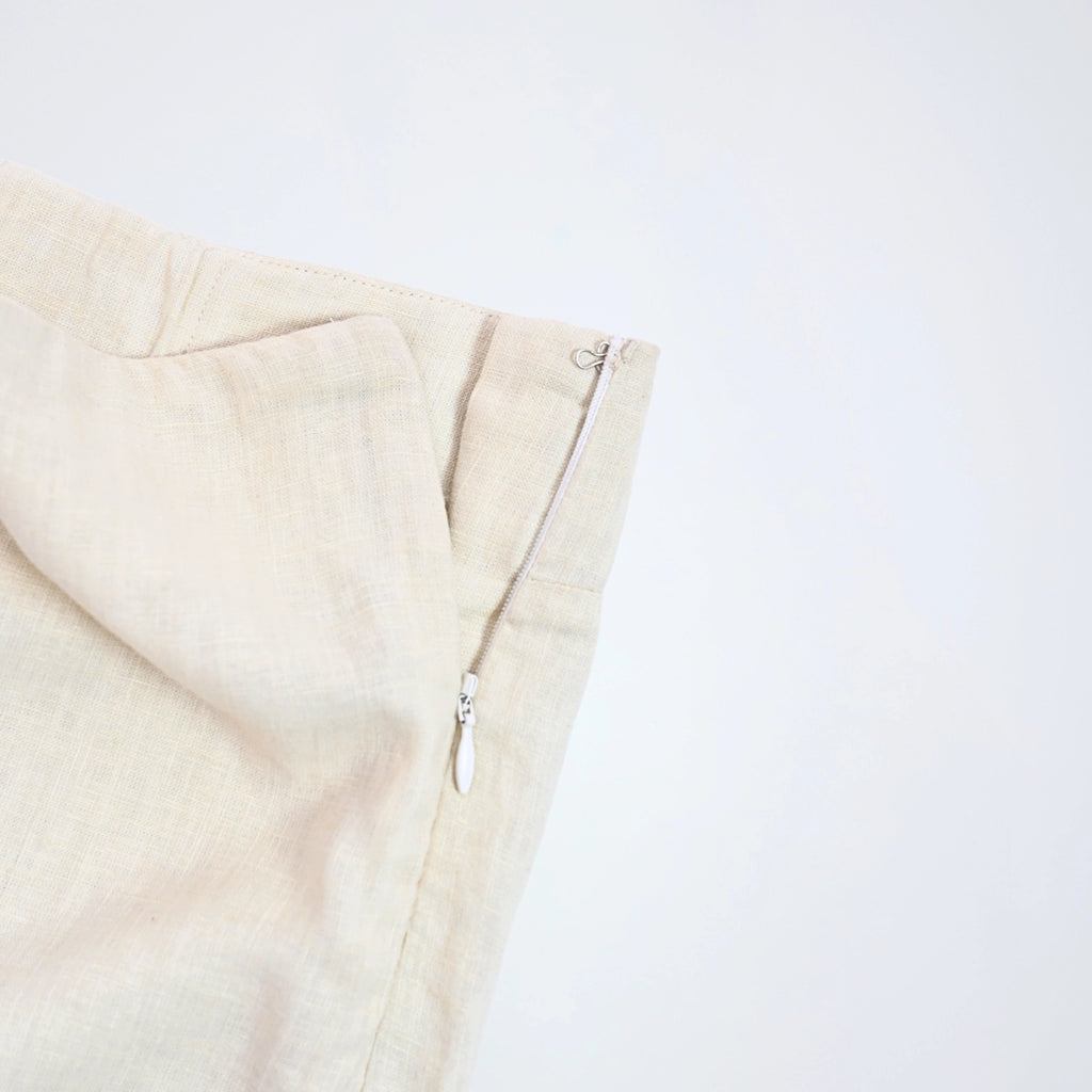 Pearl linen shorts with crisp structure and side-zip. Breathable, mid-rise, and versatile for adapting throughout your day | Selfish Clarity