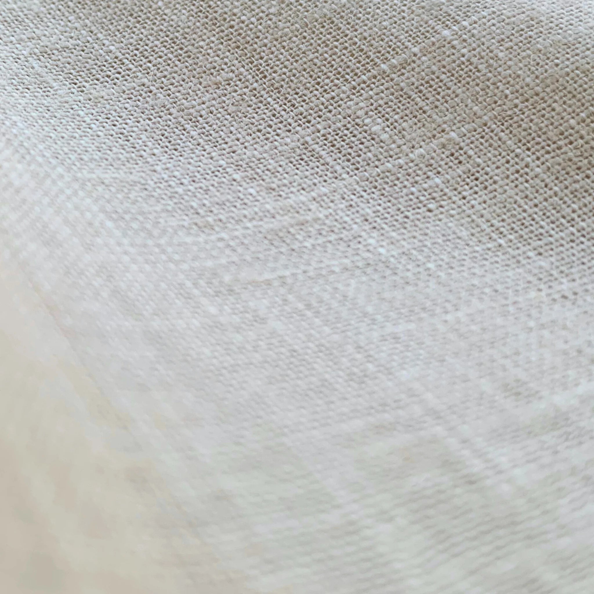 Close-up of textured pearl linen fabric