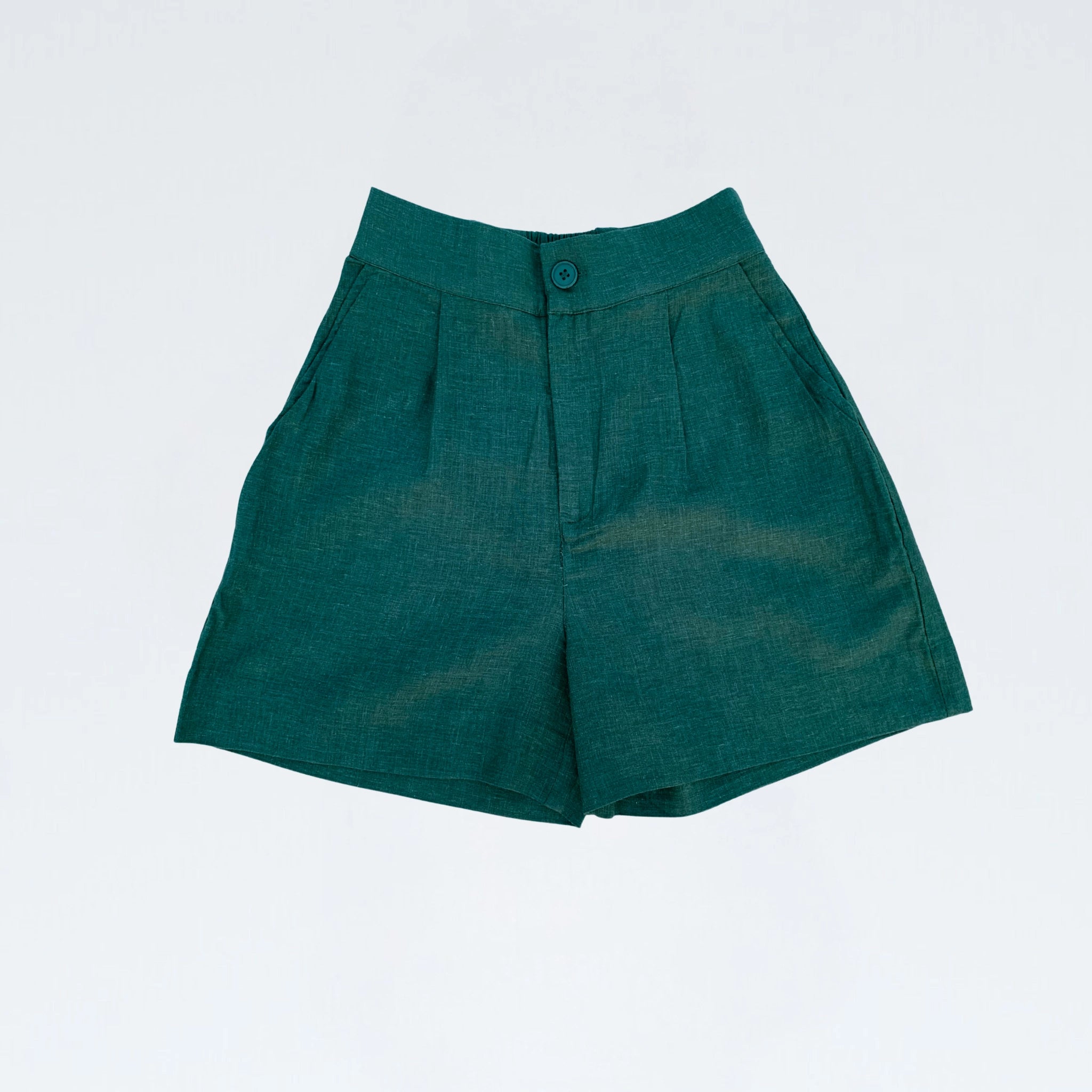 Emerald linen shorts with a stretch waistband. Breathable, high-rise, and easy to pair for everyday versatility | Selfish Clarity