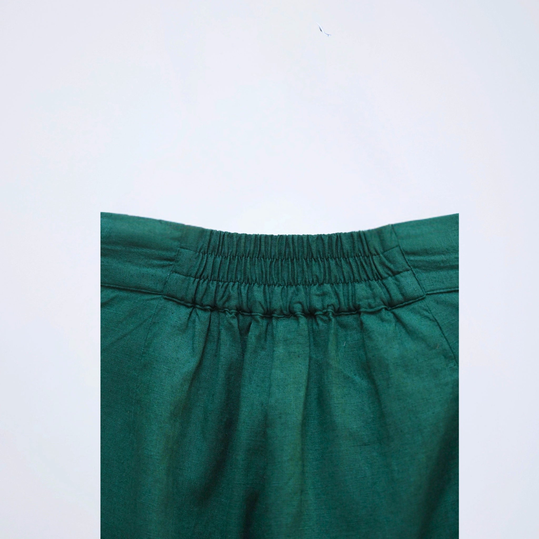 Emerald linen shorts with a stretch waistband. Breathable, high-rise, and easy to pair for everyday versatility | Selfish Clarity