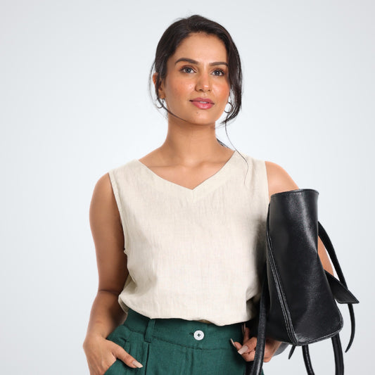 Clean, breathable sleeveless linen tank. Lightweight, relaxed fit for effortless comfort and layering through long days