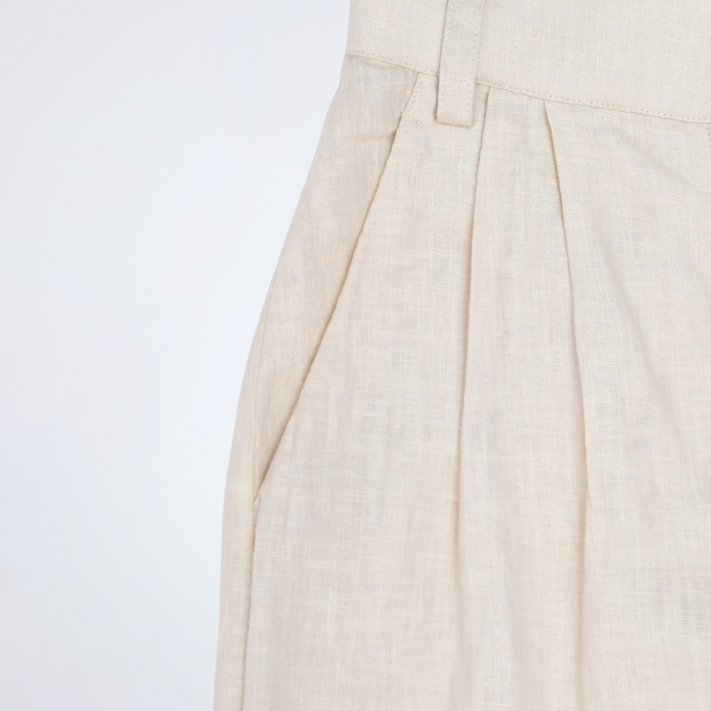Pearl linen pants with soft pleats and a stretch waist. Lightweight, breathable, and roomy for all-day comfort and movement | Selfish Clarity