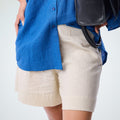 Pearl linen shorts with crisp structure and side-zip. Breathable, mid-rise, and versatile for adapting throughout your day | Selfish Clarity