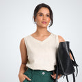 Clean, breathable sleeveless pearl linen tank. Lightweight, relaxed fit for effortless comfort and layering through long days | Selfish Clarity